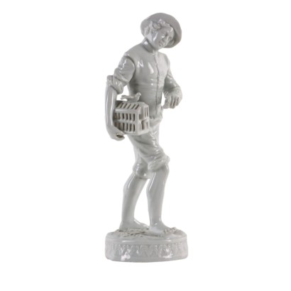 Figura de porcelana Hombre joven con jaula