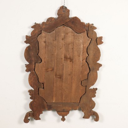 Embossed sheet metal mirror