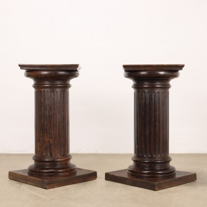 Pair of Columns Holding Statues